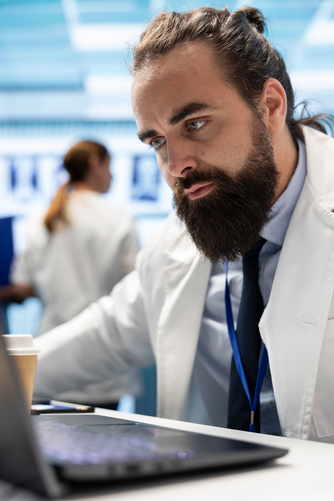 general-practitioner-reading-diagnostic-reports-official-healthcare-records